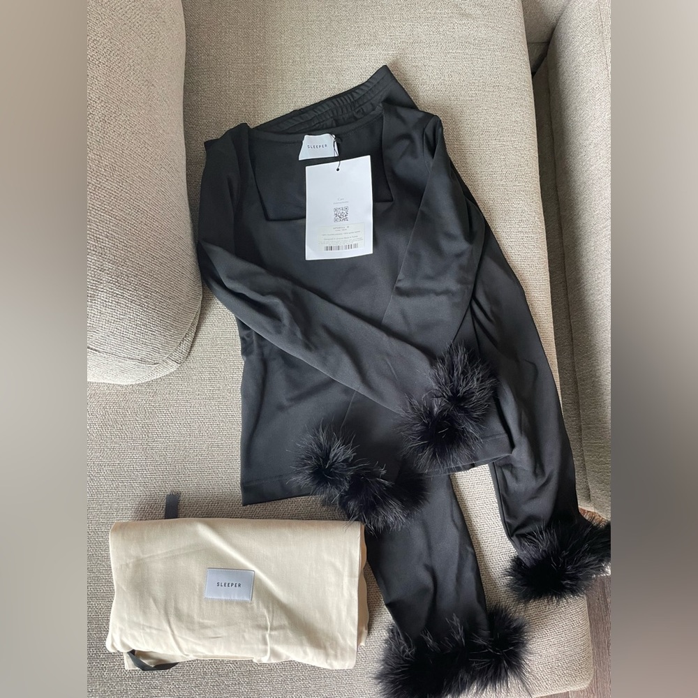NWT sleeper set! Black with feathers, size medium!